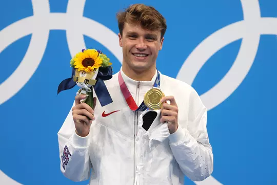 TOKYO, JAPAN - AUGUST 01: Gold medalist Robert Finke of Team United States poses in the podium of Men's 1500m Freestyle on day nine of the Tokyo 2020 Olympic Games at Tokyo Aquatics Centre on August 01, 2021 in Tokyo, Japan. (Photo by Al Bello/Getty Images)