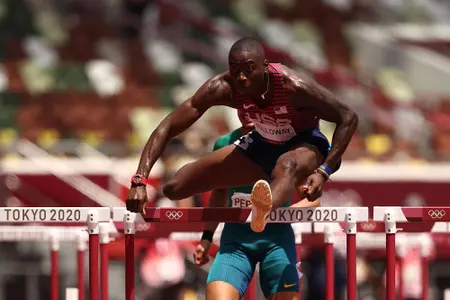 TOKYO, JAPAN - AUGUST 04: Grant Holloway of Team United States competes in the Men's 110m Hurdles Semi-Final on day twelve of the Tokyo 2020 Olympic Games at Olympic Stadium on August 04, 2021 in Tokyo, Japan. (Photo by Ryan Pierse/Getty Images)