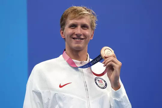 TOKYO, JAPAN - JULY 25: Kieran Smith of Team United States poses with the bronze medal for the Men's 400m Freestyle Final on day two of the Tokyo 2020 Olympic Games at Tokyo Aquatics Centre on July 25, 2021 in Tokyo, Japan. (Photo by Clive Rose/Getty Images)