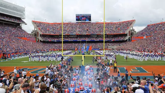 Football team about to take the field at Ben Hill Griffin Stadium