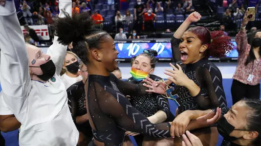 Trinity Thomas (left) and Nya Reed react after sealing UF win over Alabama 220116