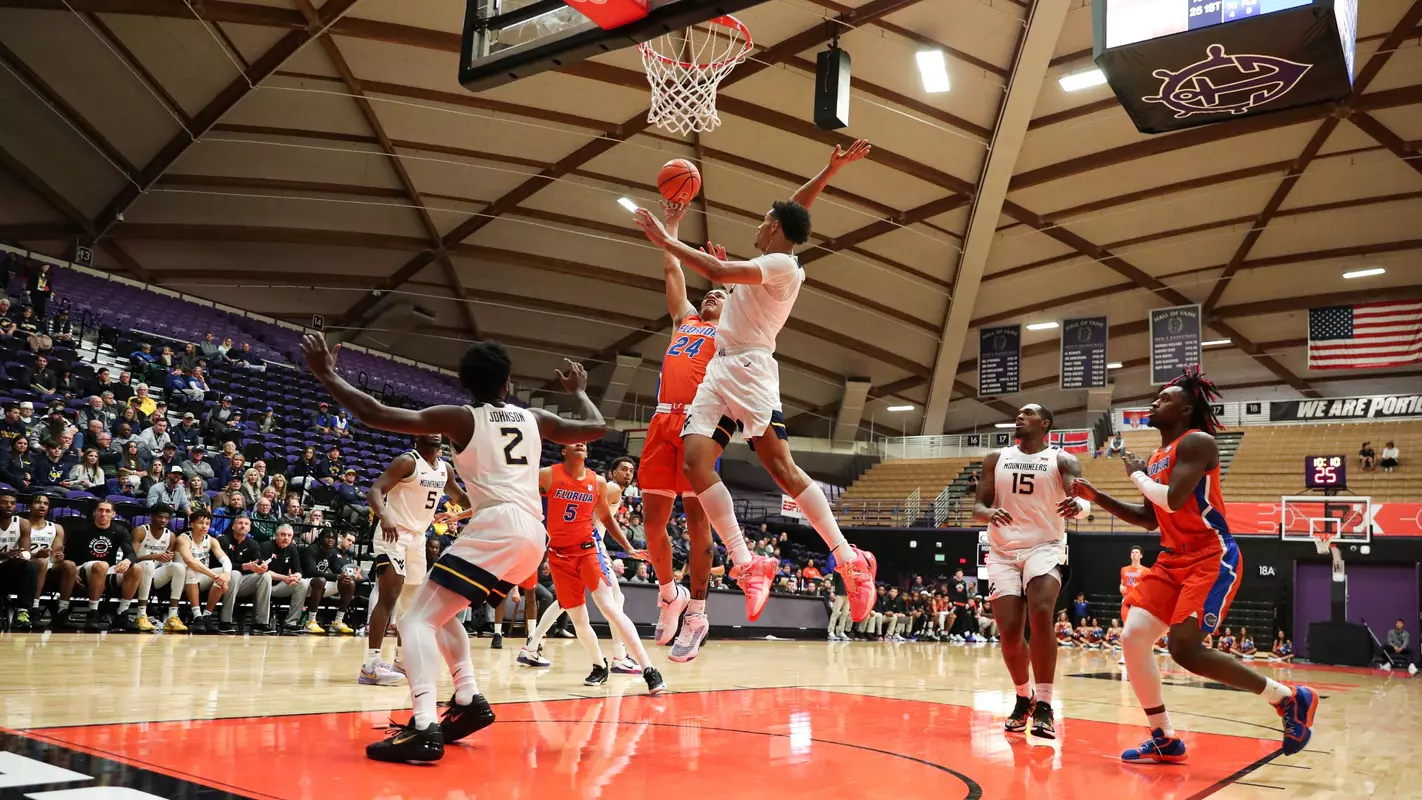 during the Gators' game against the West Virginia Mountaineers on Sunday, November 27, 2022 at Chiles Center in Portland, OR / UAA Communications photo by Maddie Washburn