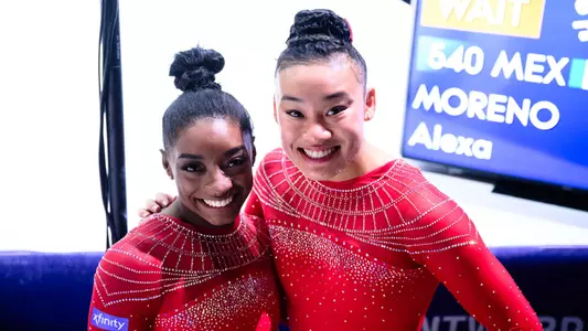 Simone Biles (left) and Leanne Wong - 2023 FIG World Championships' vault finals 231007