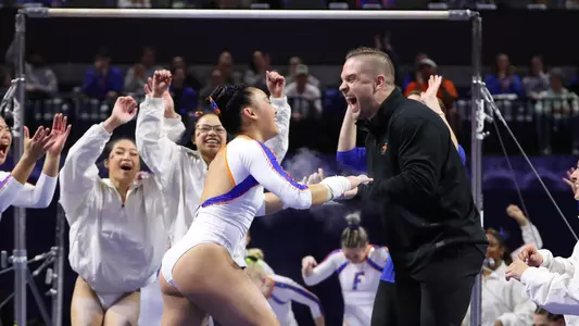 Leanne Wong and Owen Field after uneven bars routine vs Georgia 230127
