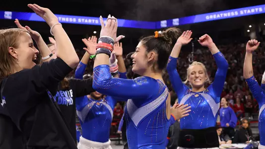 Kayla DiCello celebrates balance beam at Arkansas 230203