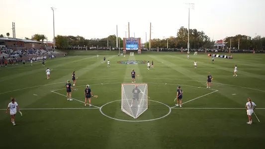 Florida vs. Syracuse players wait to start play at Dizney Stadium