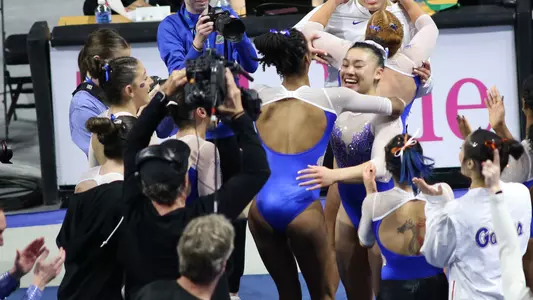 Team reaction to Leanne Wong's 10.0 floor exercise routine vs LSU 240223