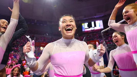 Leanne Wong celebrates her uneven bars 10.0 with teammates - 240209