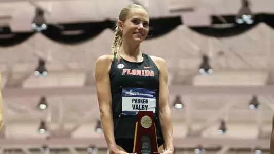 Parker Valby w/ 5000m Trophy