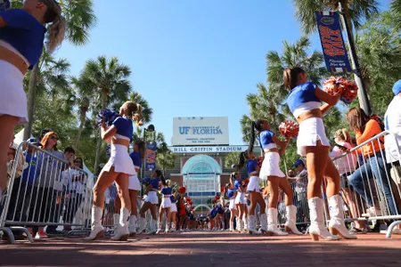 Dazzlers line up on Gator Walk in front of Ben Hill Griffin Stadium