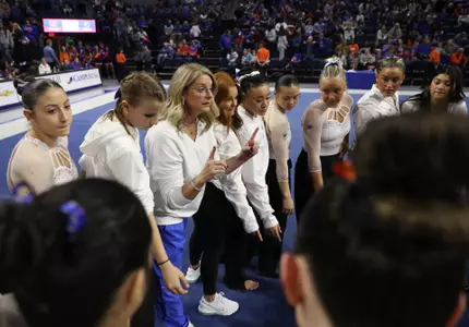 Gators 196.675, Spartans 196.650, Huskers 195.600, Huskies 191.950