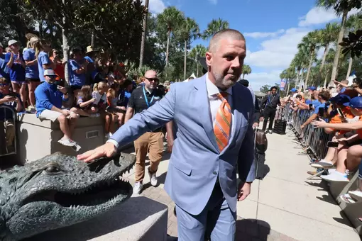 Gators head coach Billy Napier rubs the gator head for good luck prior to the Mississippi State game on UF homecoming.