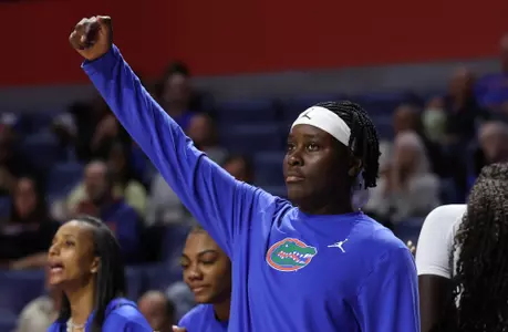 Alexia Dizeko celebrates on the sidelines