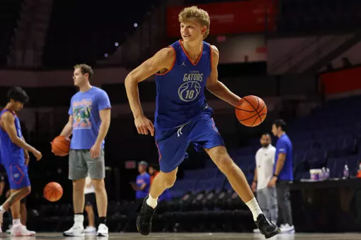 Thomas Haugh dribbles the ball at practice in the O'Dome