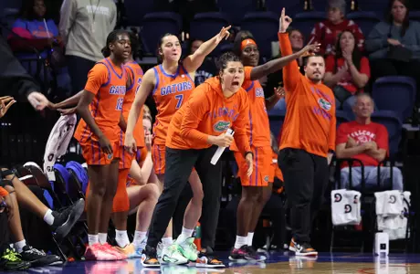 Jasmine Sborov, Daviane Mindoudi, Emilija Dakic, Alexia Dizeko, Jason Traylor celebrating on the sidelines vs. South Alabama