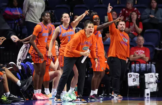 Jasmine Sborov, Daviane Mindoudi, Emilija Dakic, Alexia Dizeko, Jason Traylor celebrating on the sidelines vs. South Alabama