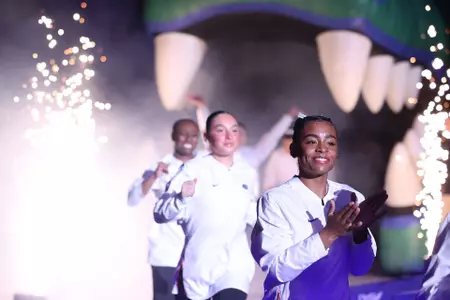 Selena Harris-Miranda and Alyssa Arana enter Exactech Arena 250110