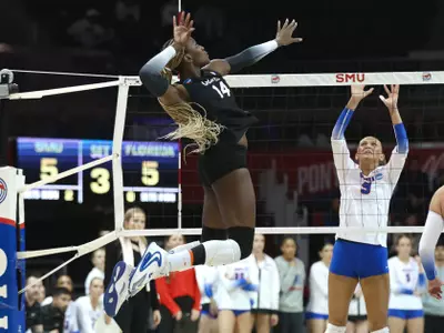 during the Gators' match against the SMU Mustangs on Saturday, December 6, 2025 at Moody Coliseum in Dallas, Tx. / UAA Communications photo by Hannah White