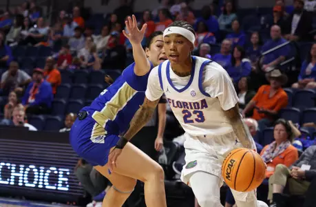 Liv McGIll drives past a Tulsa defender