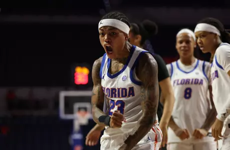 Liv McGill celebrates following a made bucket and a foul vs. Furman