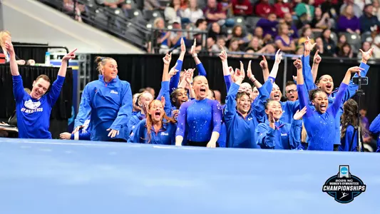 Florida cheers a floor routine at 2025 NCAA Championships