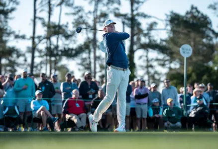 Amateur Noah Kent of the United States plays a stroke from the No. 1 tee during practice round 2 prior to the Masters at Augusta National Golf Club, Tuesday, April 08, 2025.