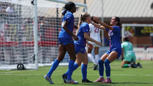 Addy Hess (center) celebrates her second goal vs Maryland 250831
