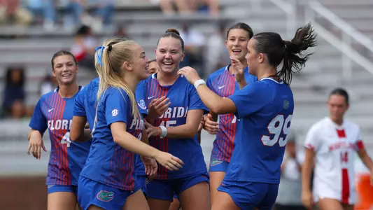 Addy Hess (left) celebrates a goal at Maryland 250831