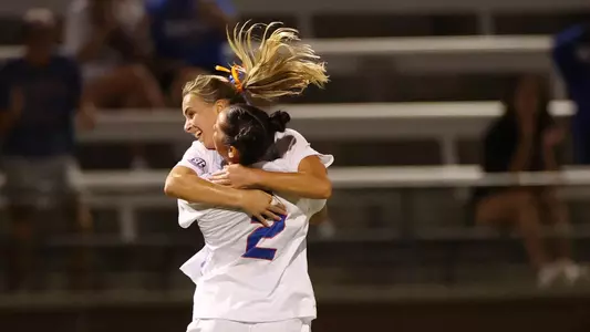 Charlotte McClure celebrates her goal with Kai Tsakiris 250904