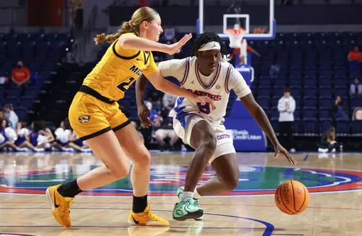 Alexia Dizeko drives against a defender in the Gators' 89-71 win over Missouri