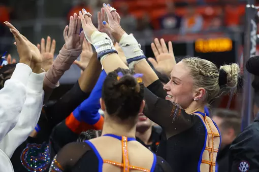 Riley McCusker celebrates uneven bars routine at Auburn 260123