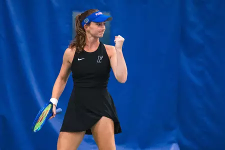 Women's Tennis player Brooke Black with the fist pump following a point at the ITA All-American Championships