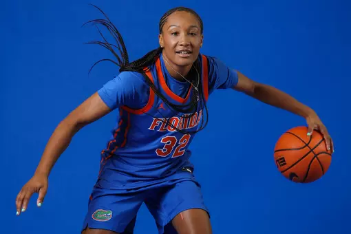 Kiyomi McMiller dribbles during her 2026 Media Day photo shoot