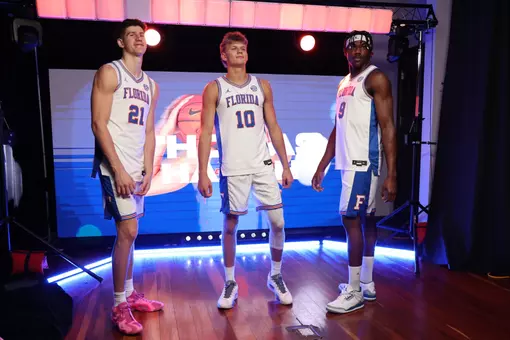 Alex Condon, Thomas Haugh and Rueben Chinyelu pose at 2025 SEC Basketball Tipoff