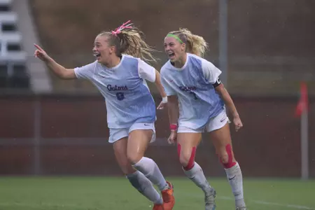 Addy Hess (#9) and Zoe Main (#7) celebrate Main's goal versus LSU 261002
