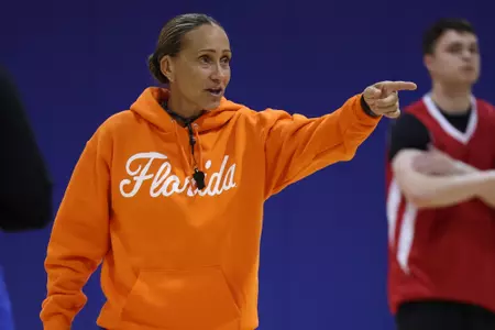 Head Women's Basketball Coach Tammi Reiss directs traffic at a preseason practice.