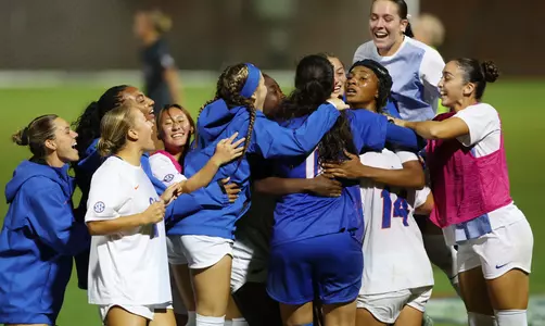 Lena Bailey (far right with headband) celebrates with the Gators her game-winning goal vs No. 5 Alabama 261008