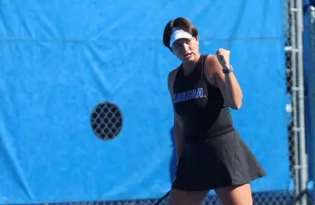 Valery Gynina celebrates after winning a point vs. Troy