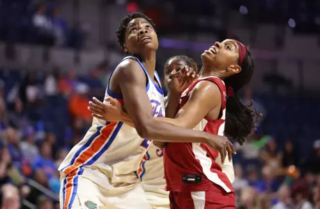Gift Ezekiel battles for the rebound against Alabama
