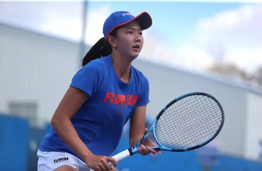 Xinyi Nong awaits the serve against Auburn