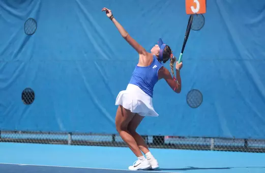 Lucie Pawlak serves against Auburn