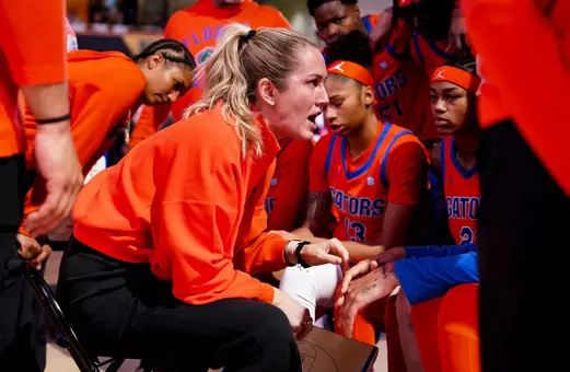 Head Coach Kelly Rae Finley huddles with her team during a timeout at Vanderbilt