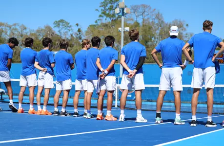 Men's Tennis during announcements team prior to the start of doubles play.