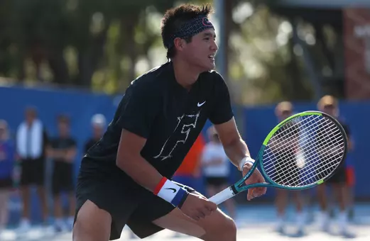 Tanapatt Nirundorn awaiting a serve at the net in doubles against No. 5 TCU.