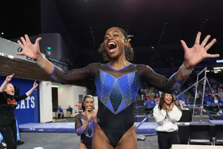 Selena Harris-Miranda reacts to her second consecutive balance beam 10.0 260313