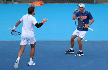 Kevin Edengren celebrating with Pablo Perez Ramos during singles.