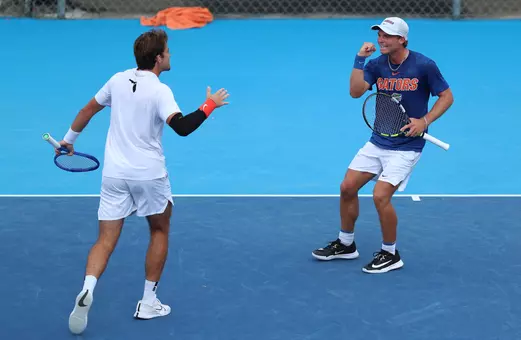 Kevin Edengren celebrating with Pablo Perez Ramos during singles.