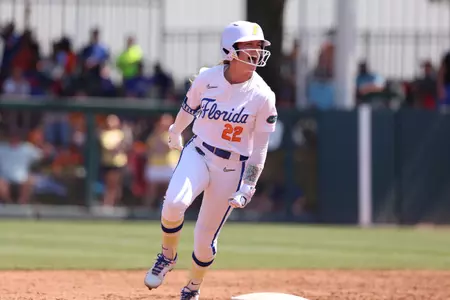 Cassidy McLellan celebrates a home run against Tennessee