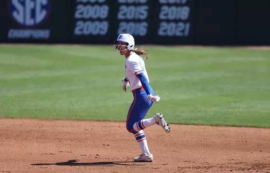 Taylor Shumaker celebrates after hitting a home run against No. 1 Tennessee