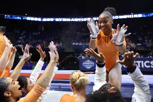 Skye Blakely high fives after her 9.975 uneven bars routine at the SEC Championship meet 260321